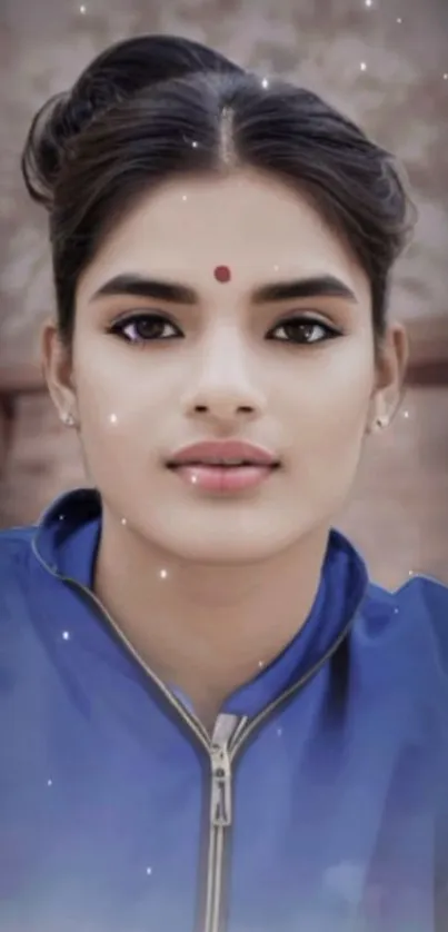 Elegant portrait of a serene woman in blue.