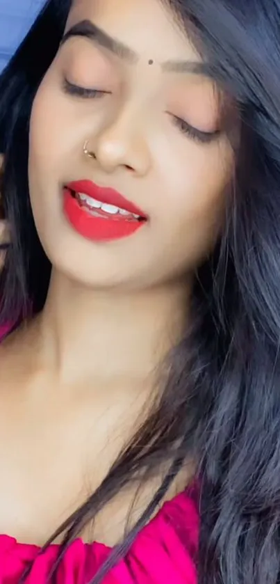 Elegant woman portrait with red lips and dark hair.