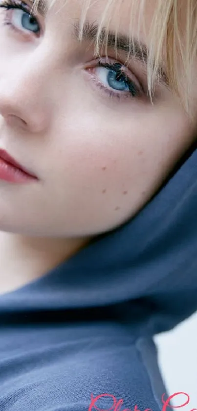 Elegant portrait wallpaper with cool blue tones.