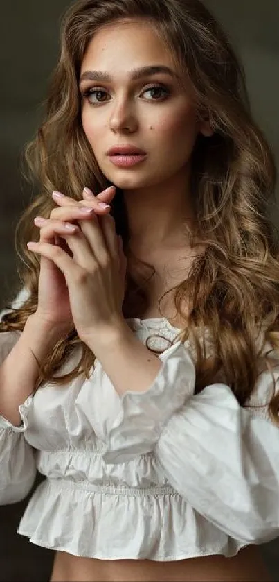 Elegant portrait of a woman in a white blouse, perfect for mobile wallpaper.