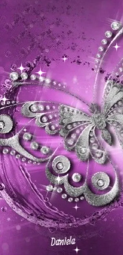 Elegant jewel-encrusted butterfly on purple background wallpaper.