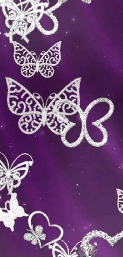 Elegant wallpaper with silver butterflies on a purple background.