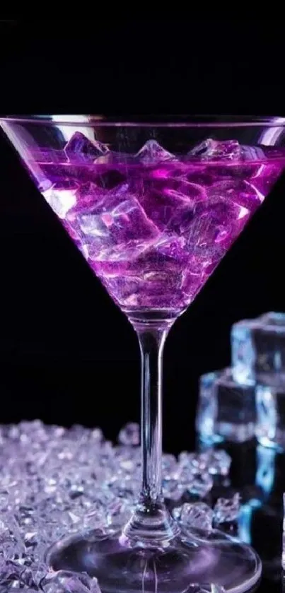 Purple cocktail with ice cubes in a glass on a creative wallpaper.