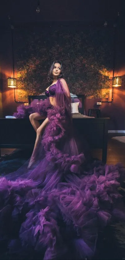 Model in a luxurious purple dress in a stylish, dimly lit room.