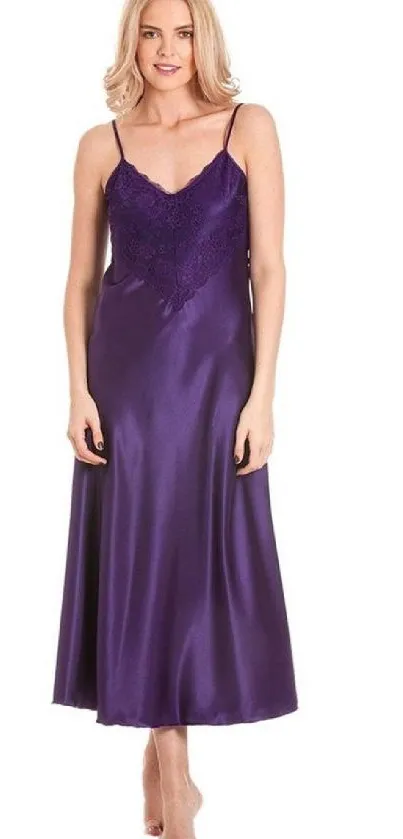 Elegant woman in silky purple evening gown.