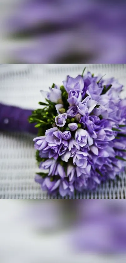 Mobile wallpaper with a purple floral bouquet.