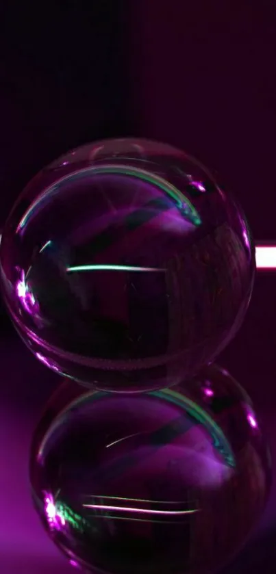 Vibrant purple glass sphere wallpaper with reflections.