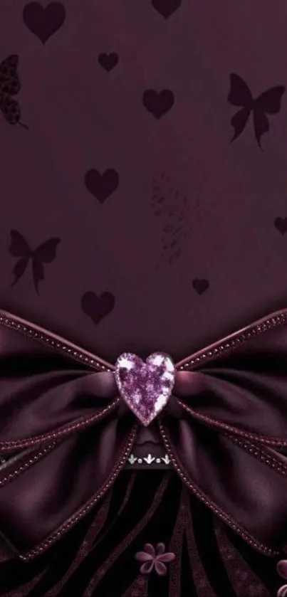 Purple bow with heart and butterfly design wallpaper.