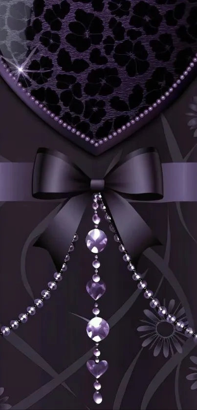 Elegant purple heart wallpaper with bow and jewels.