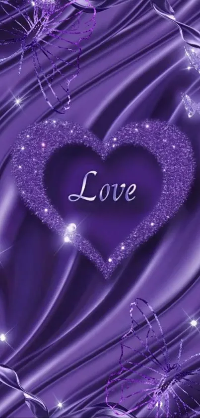 Purple love heart with glittery accents on mobile wallpaper.