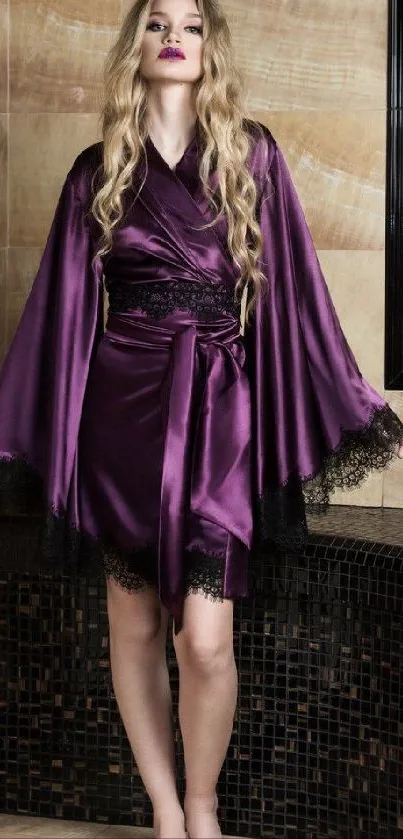 Woman in luxurious purple robe in elegant bathroom setting.