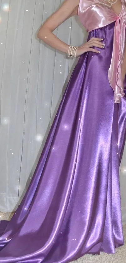 Elegant purple satin dress displayed with shimmering effect.