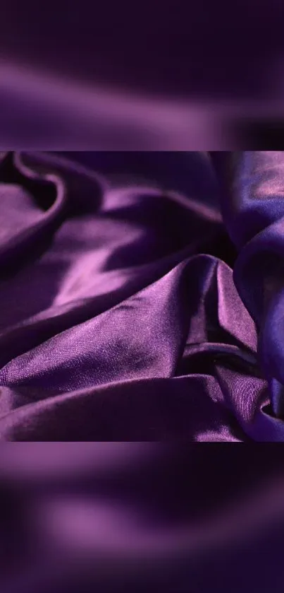 Luxurious purple silk fabric texture for elegant mobile background.