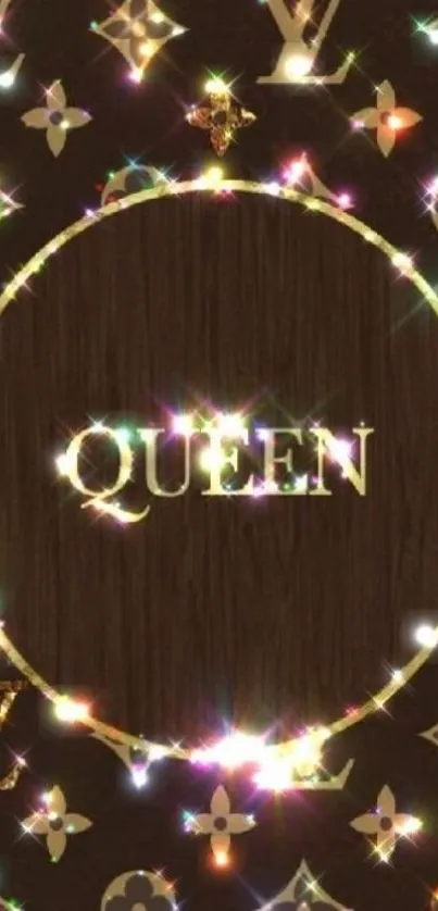 Queen-themed wallpaper with sparkling symbols on a dark brown background.