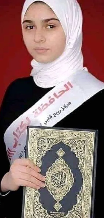 Portrait with Quran on maroon background, elegant and spiritual.