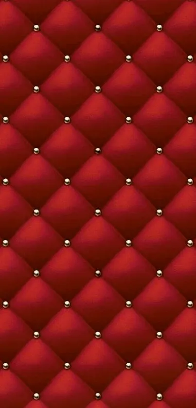 Elegant red diamond pattern wallpaper with quilted leather look.