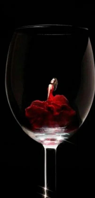 Woman in red dress within a wine glass on dark background.