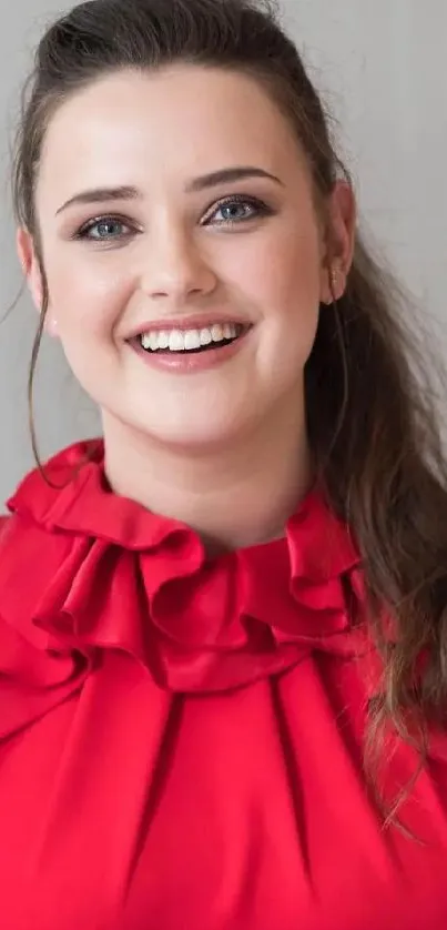 Smiling woman in a red dress with elegant style.