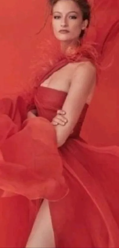 Woman in an elegant red flowing dress.