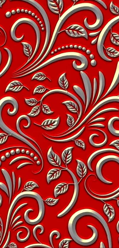 Elegant red floral wallpaper with silver and gold swirls.