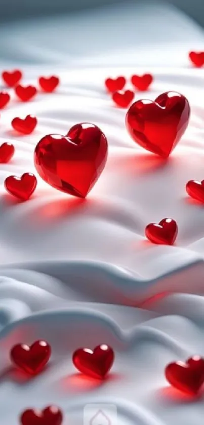 Elegant 3D red hearts on white fabric background wallpaper.