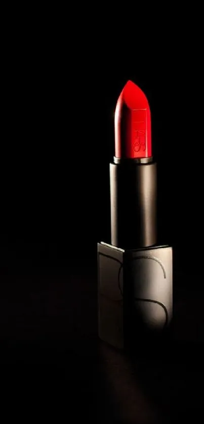 Elegant red lipstick on a black background wallpaper.