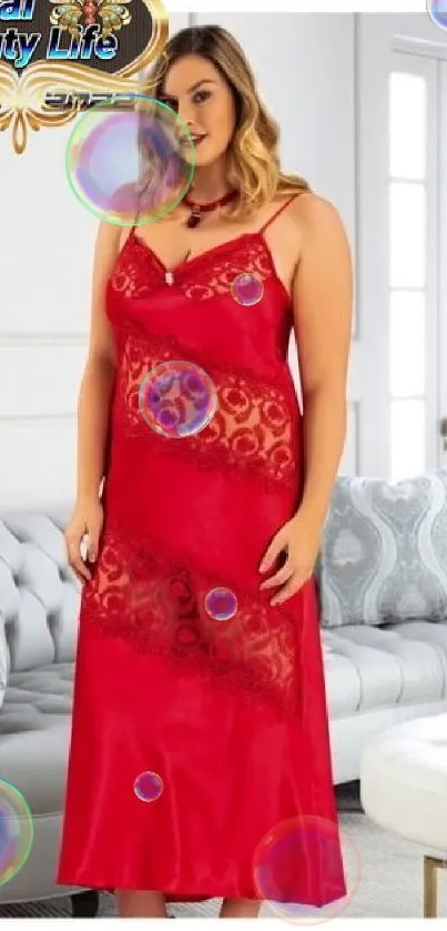 Model in red lace nightgown in elegant living room setting.