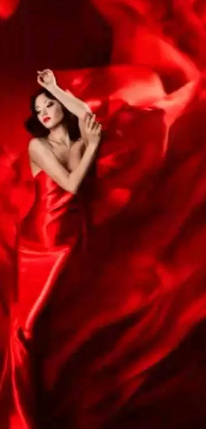 Woman draped in vibrant red silk, elegant mobile wallpaper.