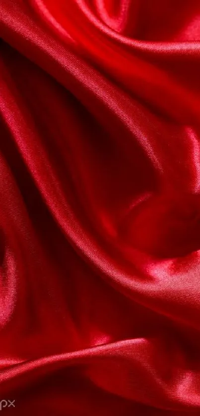 Luxurious red silk fabric texture for mobile wallpaper.