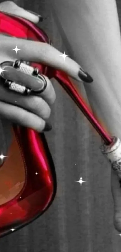 Red stiletto heel used as bottle opener on monochrome background.