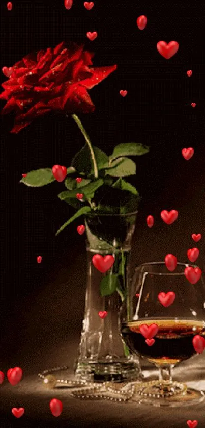 Red rose in vase with wine glass.