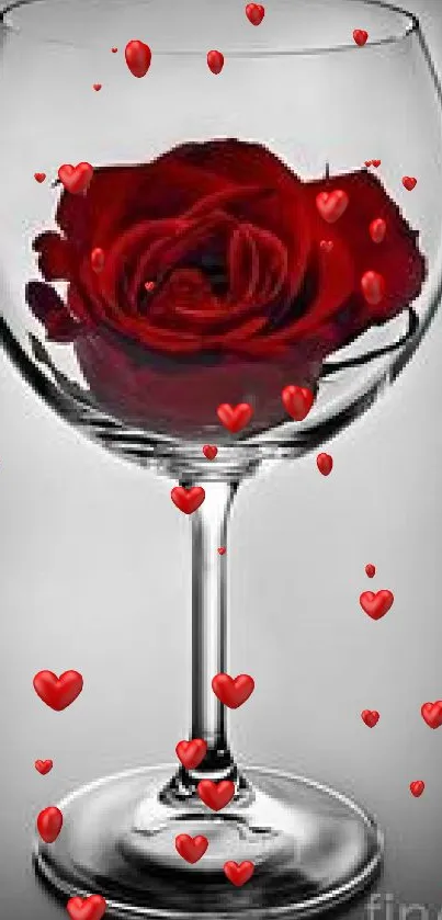 Mobile wallpaper with a red rose in a glass, offering elegance and beauty.