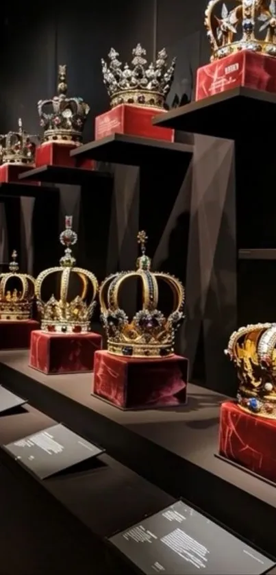 A display of royal crowns on velvet in a museum setting.