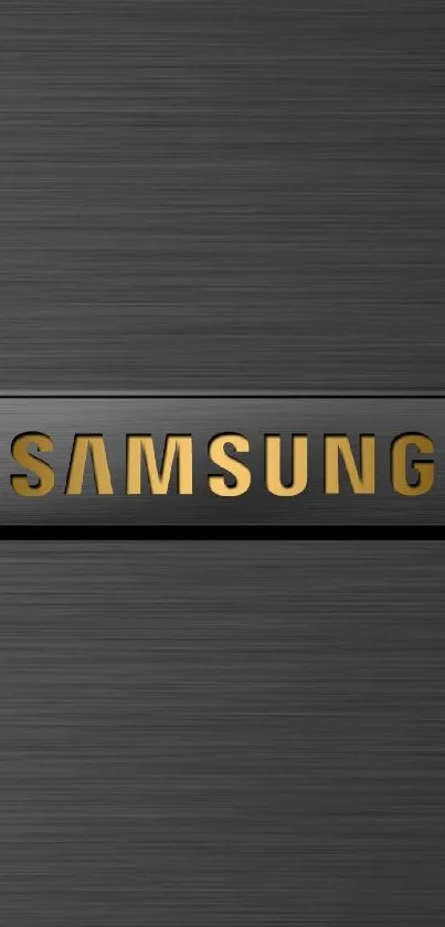 Metallic Samsung wallpaper with gold accent and dark gray background.