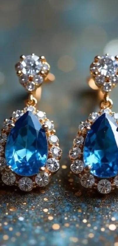 Close-up of elegant sapphire earrings with diamond accents.