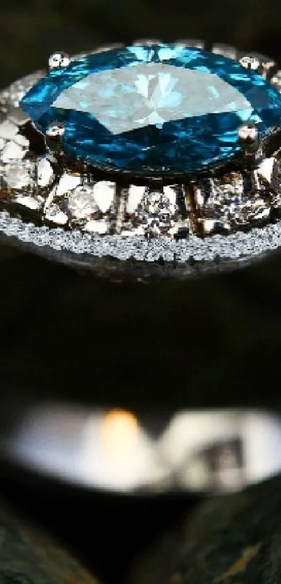Mobile wallpaper featuring a sapphire ring with diamonds against a green background.