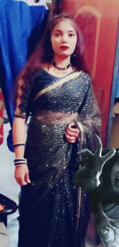 Woman in navy saree with ghostly figure in haunted setting.