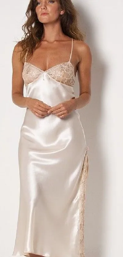 Elegant satin slip dress with lace details.