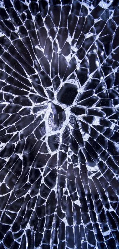 Shattered glass pattern with blue hues on a mobile wallpaper.