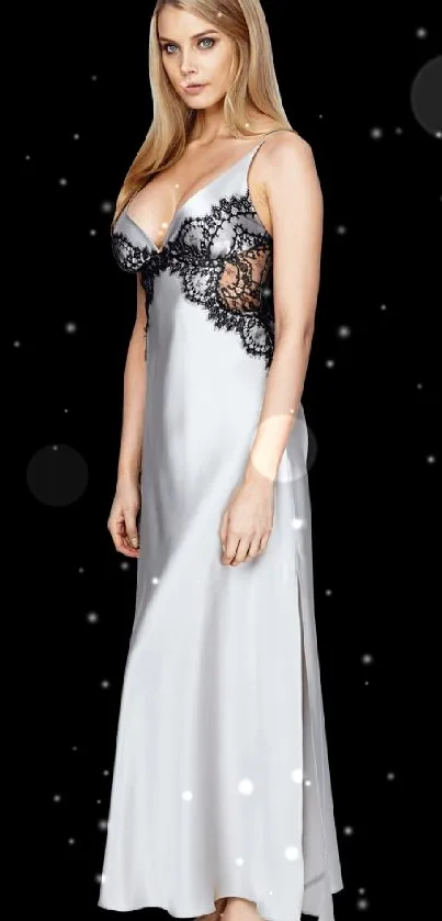 Elegant lady in a silver gown with lace detail.