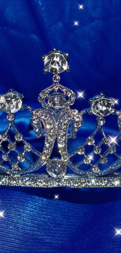 Silver crown with jewels on a royal blue background