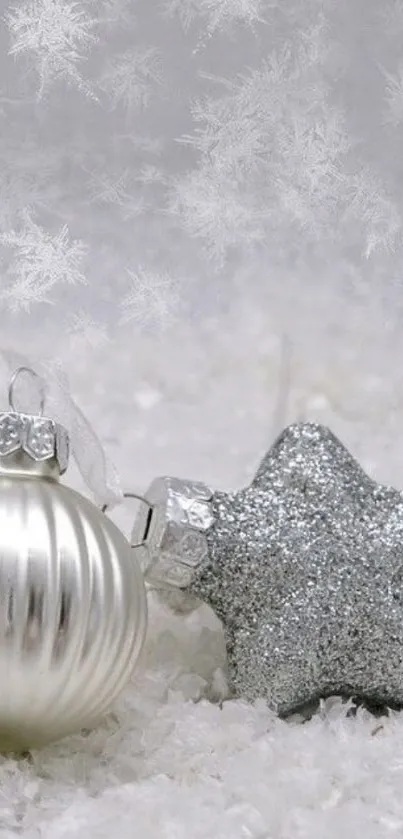 Elegant silver and white holiday wallpaper with ornaments.