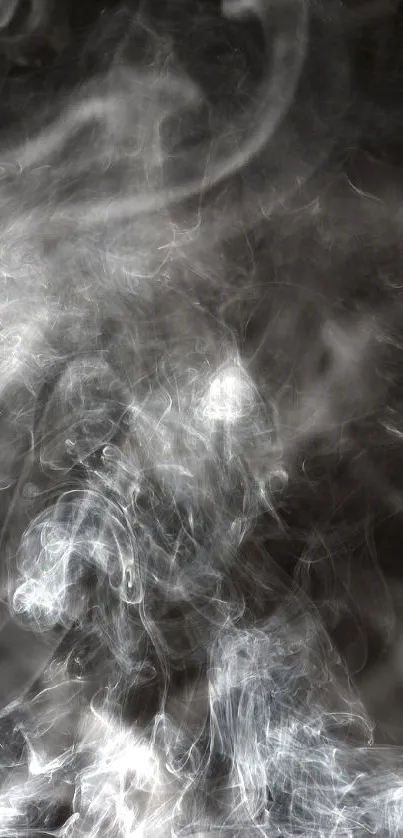 White smoke swirls on a black background wallpaper.