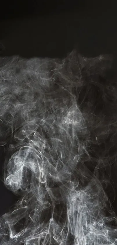 Swirling gray smoke on a black background wallpaper.