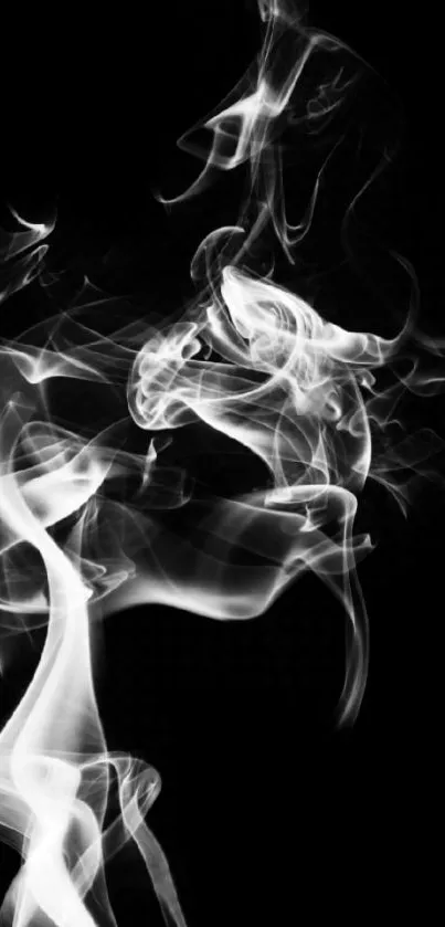 Graceful white smoke swirls on a black background, creating an elegant abstract design.
