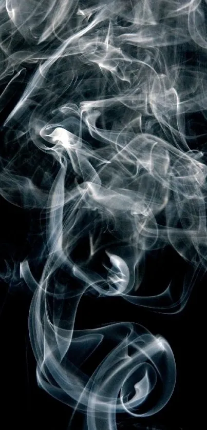 Artistic smoke swirls on a black background wallpaper.