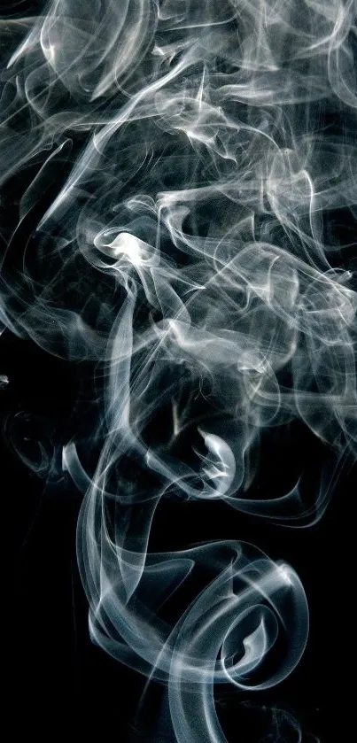 Mystical swirls of white smoke on a black background.