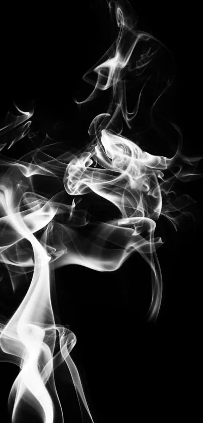 Elegant white smoke swirls on a dark black background.