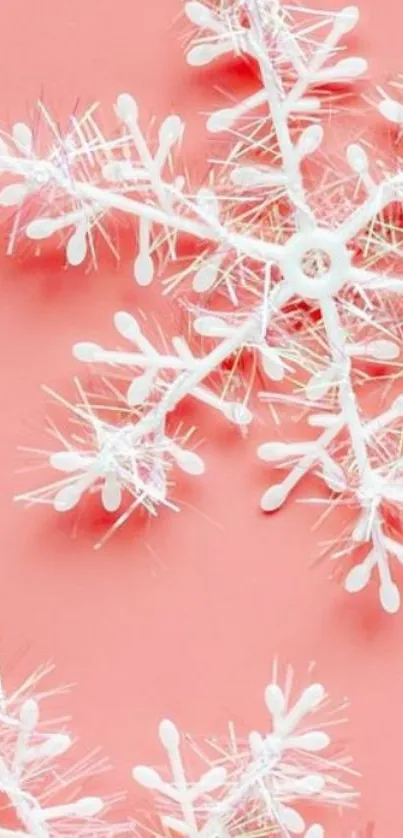 Elegant white snowflake on coral background wallpaper.