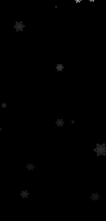 Elegant snowflakes on a black background for mobile wallpaper.